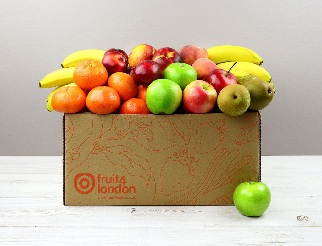 Office Fruit Box containing apples, bananas, pears, clementimes or satsumas and seasonal fruit