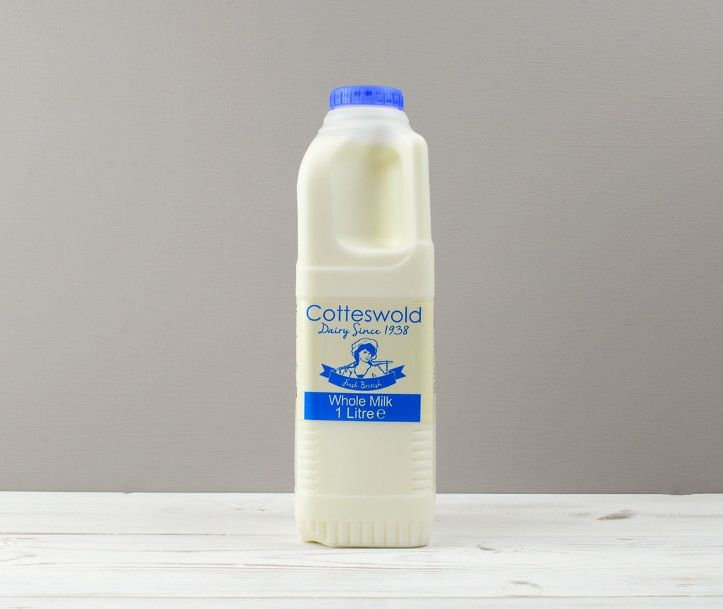 Cotteswold 1 litre of whole milk carton with blue cap ready for Home Delivery