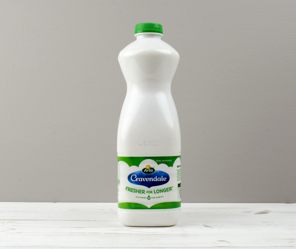 Arla Cravendale 1 litre Semi-Skimmed milk with a green bottle cap