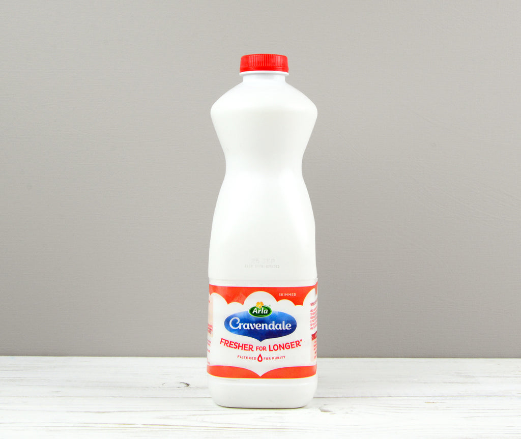 Arla Cravendale 1 litre of Skimmed milk with a red bottle cap
