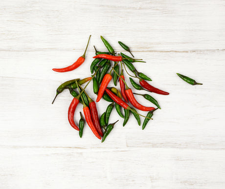 Mixed bunch of green and red Chillies locally sourced for Home or Office Delivery
