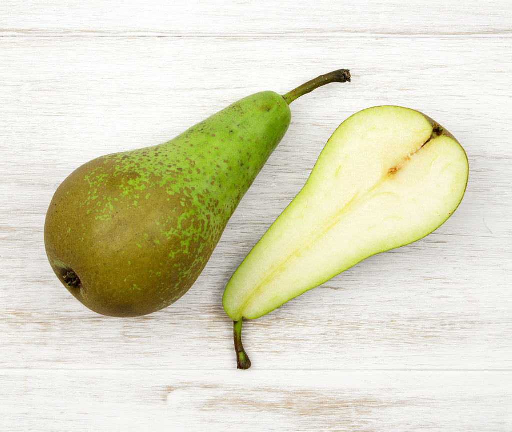 One sliced Conference Pear locally sourced and perfect for your customised Fruit Box
