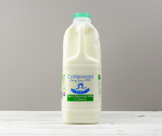 Cotteswold 2 litres of Semi Skimmed milk carton with a green cap ready for Home Delivery