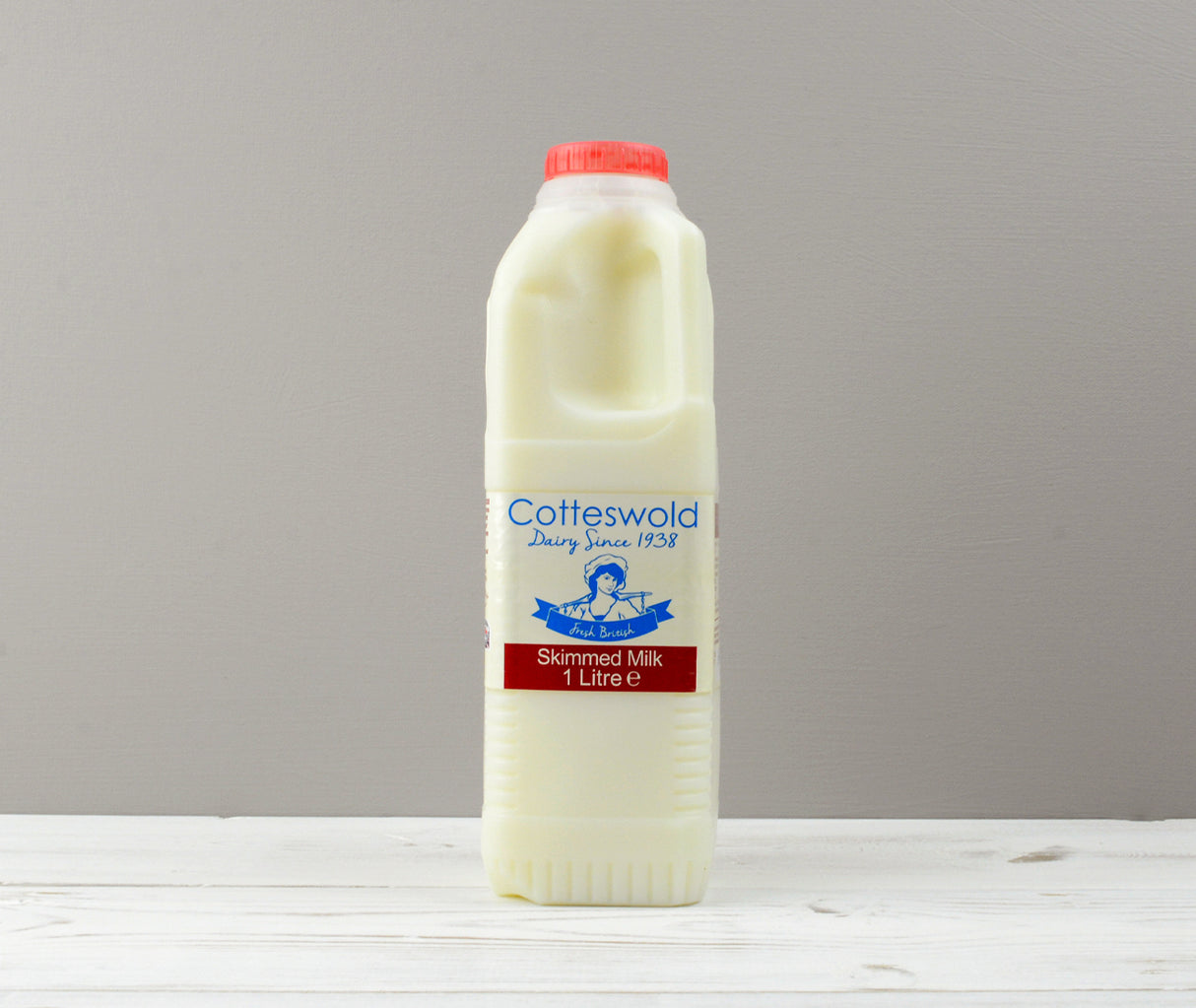 Cotteswold 1 litre of Skimmed milk carton with red cap ready for Home Delivery