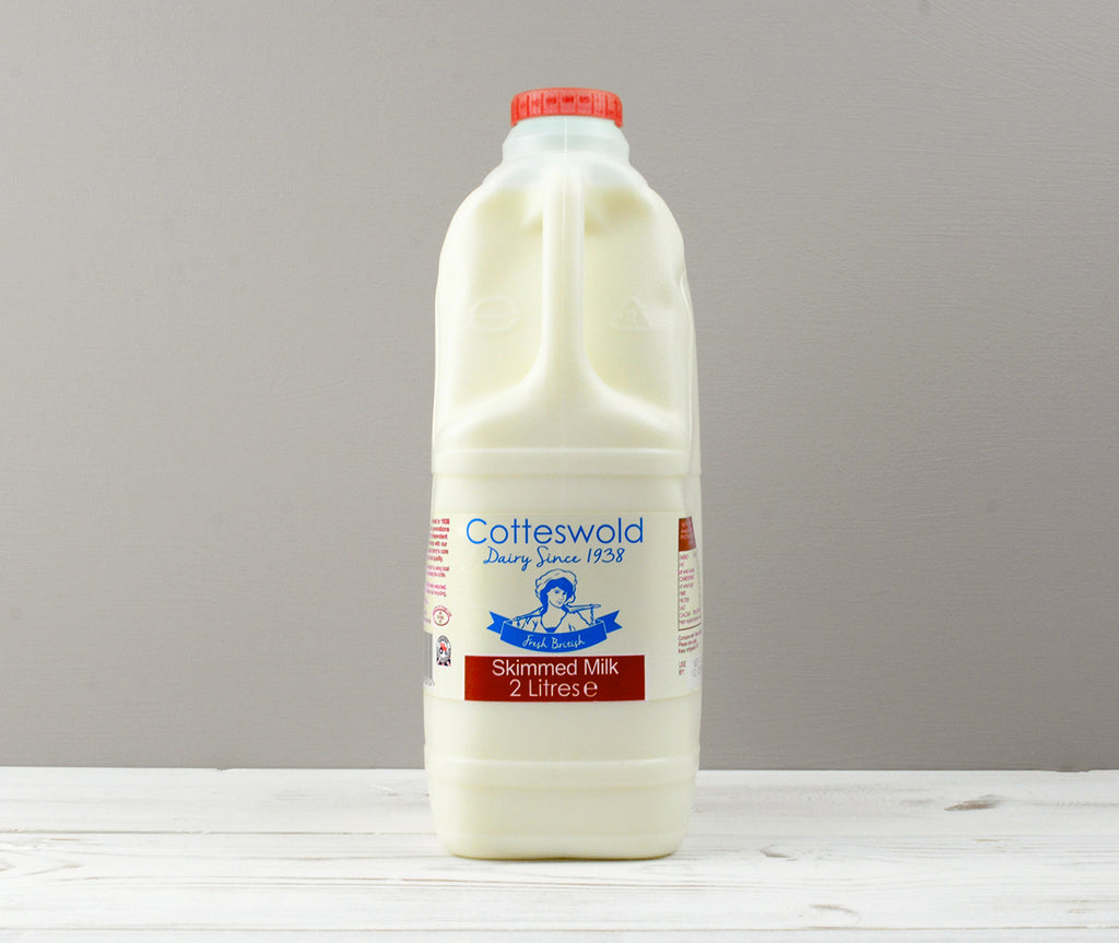 Cotteswold 2 litres of Skimmed milk carton with red cap ready for Home Delivery