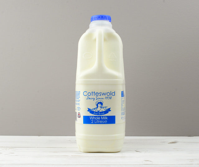 Cotteswold 2 litres of whole milk carton with blue cap ready for Home Delivery