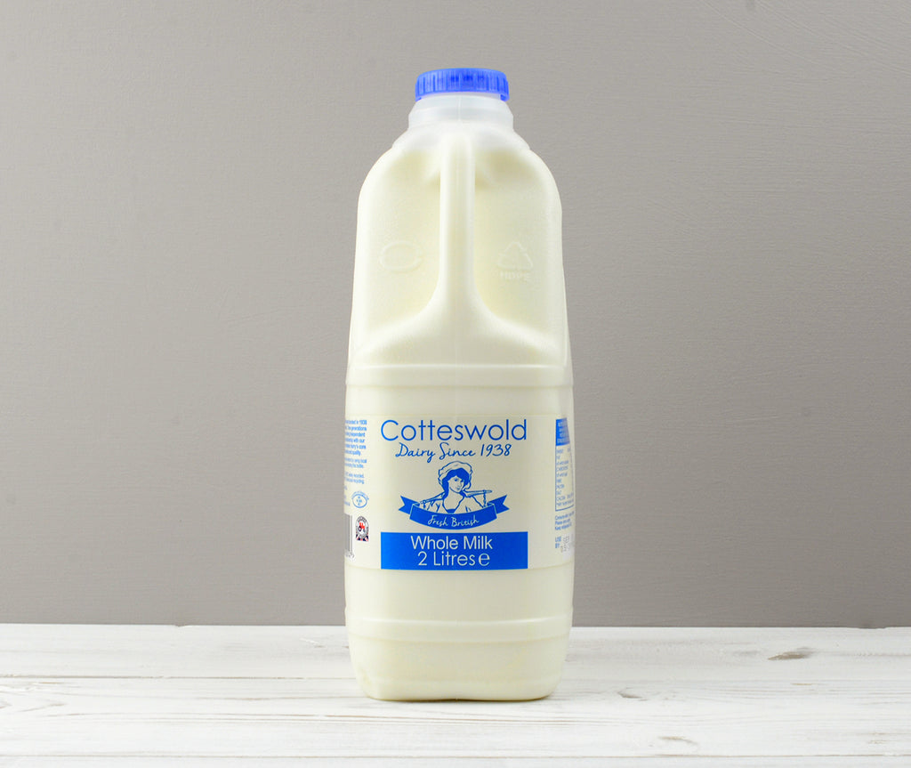 Cotteswold 2 litres of whole milk carton with blue cap ready for Home Delivery