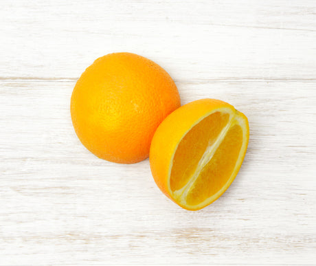 One sliced Large Orange locally sourced and perfect for your customised Fruit Box