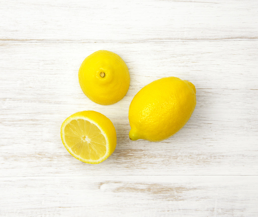 One sliced and one whole Lemon locally sourced and perfect for your customised Fruit Box