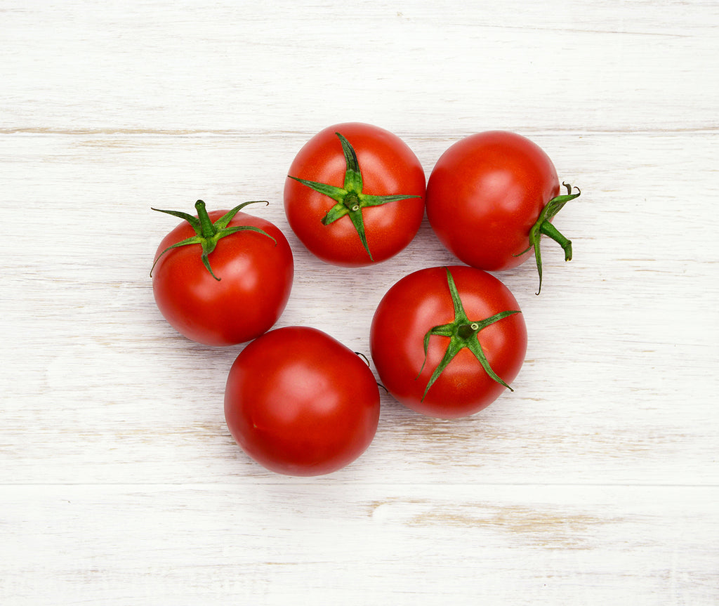 One handful of Loose Tomatos locally sourced and perfect for your customised Vegetable Box